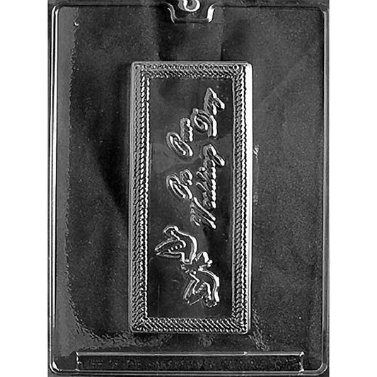 Chocolate bar mold with one rectangular cavity reading On Our Wedding Day, framed by a woven-look border and two doves