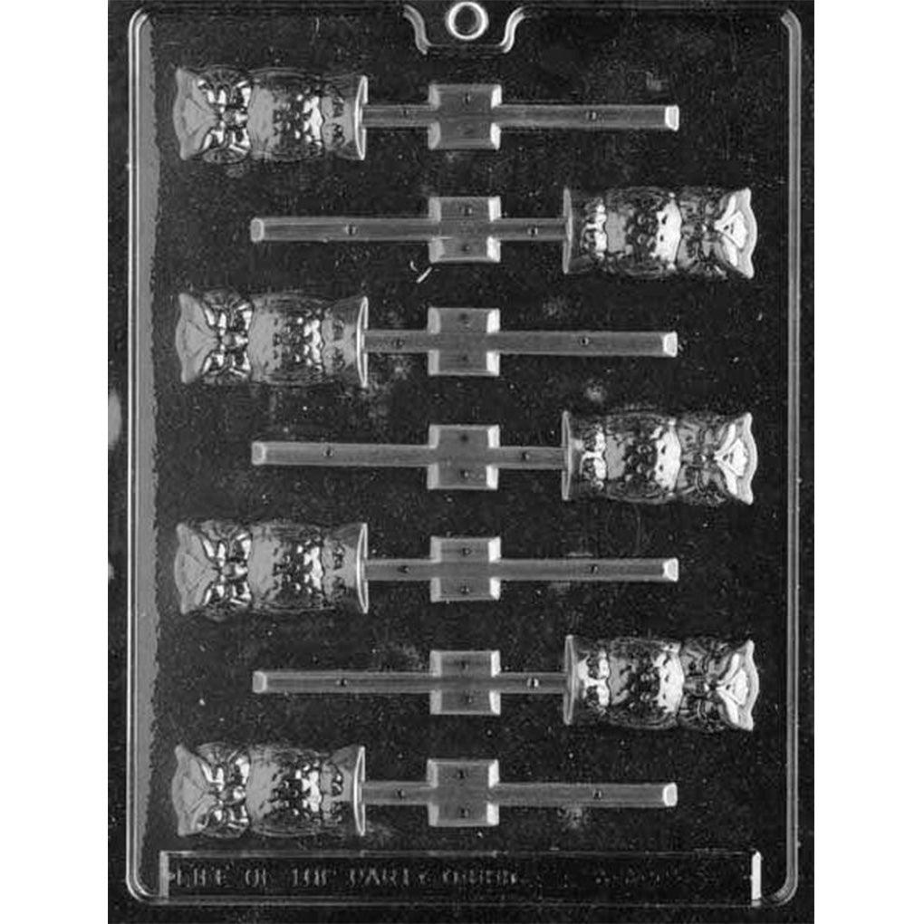 Clear plastic chocolate lollipop mold with eight small owl-shaped cavities arranged in two columns, each with feather texture, round eyes, and built-in stick channels for mini owl pops.