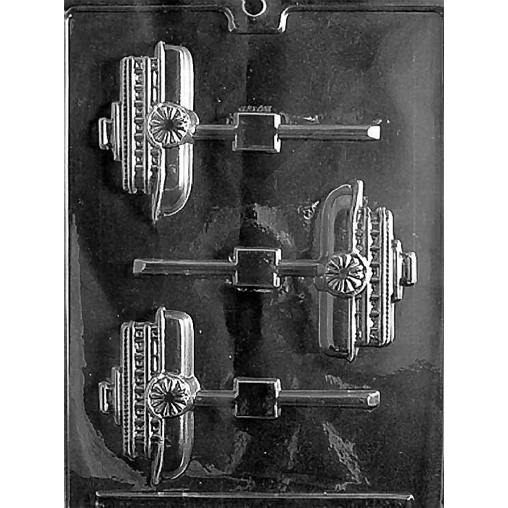 Clear plastic chocolate lollipop mold with three paddle wheeler steamboat cavities and stick channels.