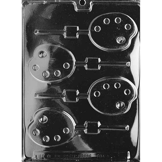 Four-cavity painter’s palette chocolate lollipop mold with curved palette shapes, four round paint dabs, thumb-hole details, and individual stick channels.