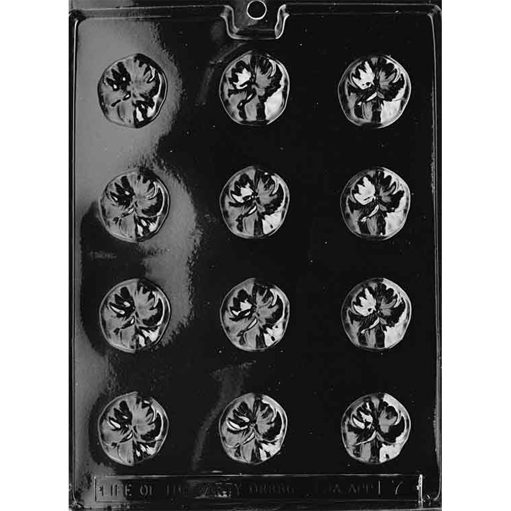 Clear plastic chocolate mold with twelve small round cavities, each featuring a pansy flower design with petal shapes and a detailed center.