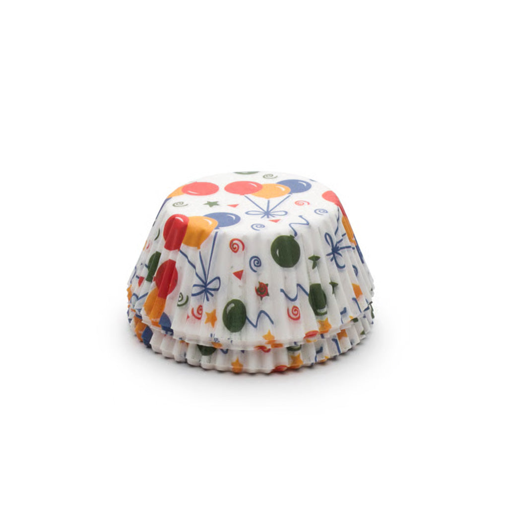 Stack of standard white paper baking cups printed with colorful balloons, stars, streamers, and confetti