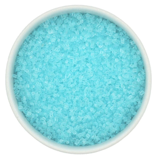 Top-down view of a white bowl filled with pastel blue coarse sanding sugar, showing larger light blue crystals with a bright sparkling finish.