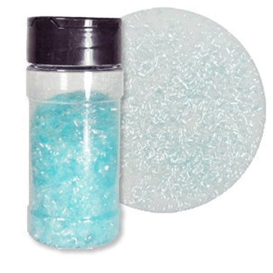 One-ounce shaker jar of pastel blue edible glitter flakes beside a round close-up swatch showing the iridescent flake texture