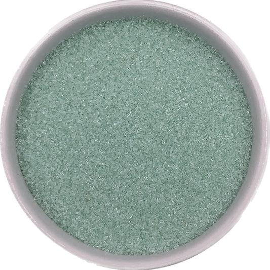 Pastel green fine sanding sugar, light mint-colored crystals ideal for Easter cookies and spring cupcakes.