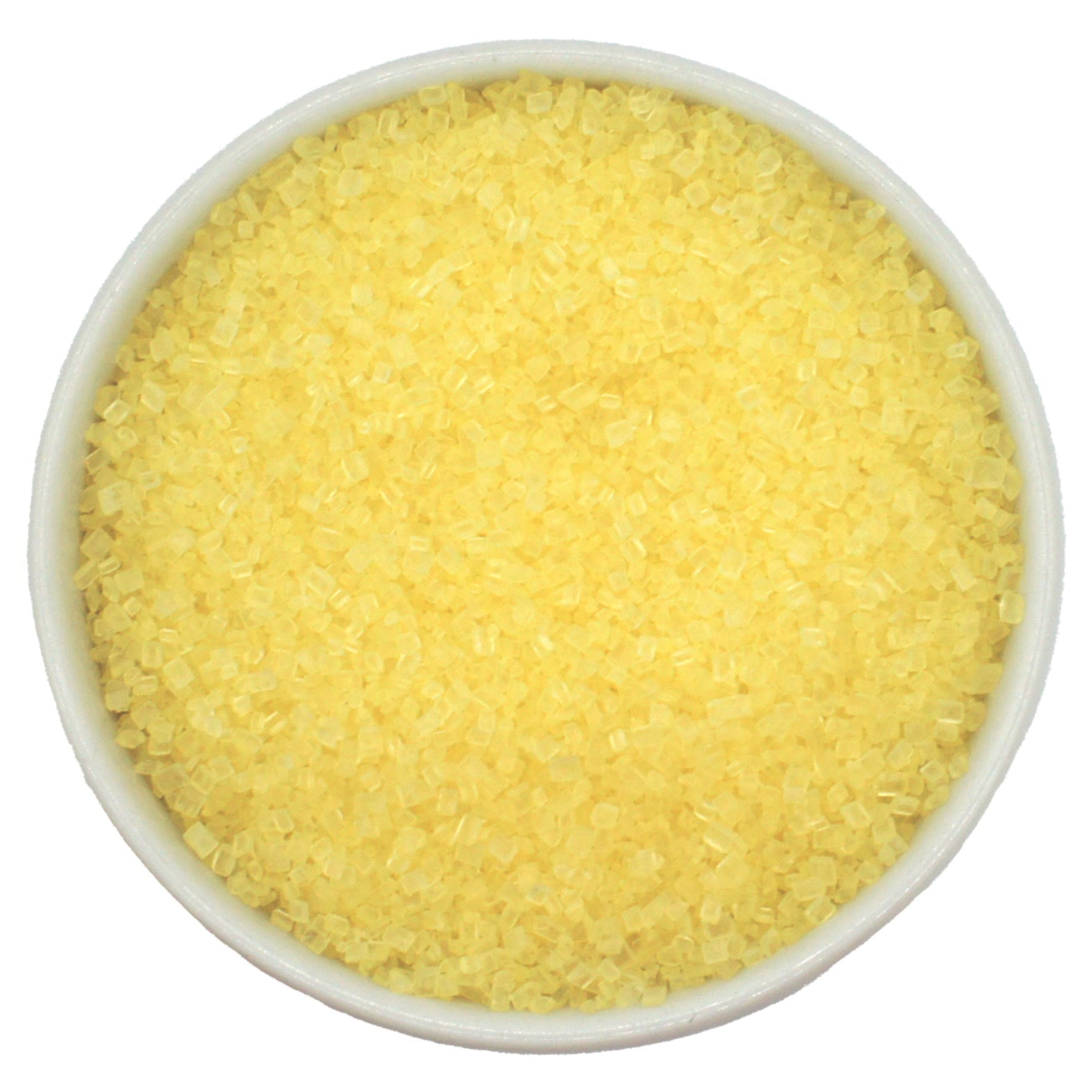 Bowl of pastel yellow coarse sanding sugar crystals on a white background.