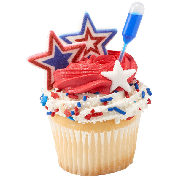 Cupcake decorated with red icing, sprinkles, and red, white, and blue star sugar decorations.