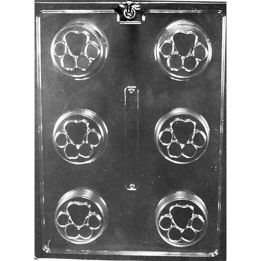 Clear plastic chocolate mold with six round cavities sized for chocolate covered Oreos, each cavity featuring a paw print design with a heart-shaped center pad.