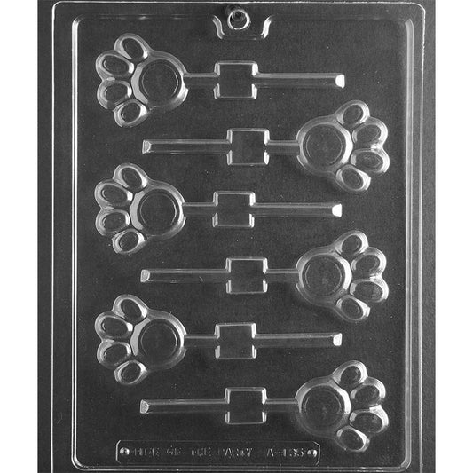 Clear plastic chocolate lollipop mold with six paw print cavities, each sized about 2 inches, designed for making paw-shaped chocolate pops.