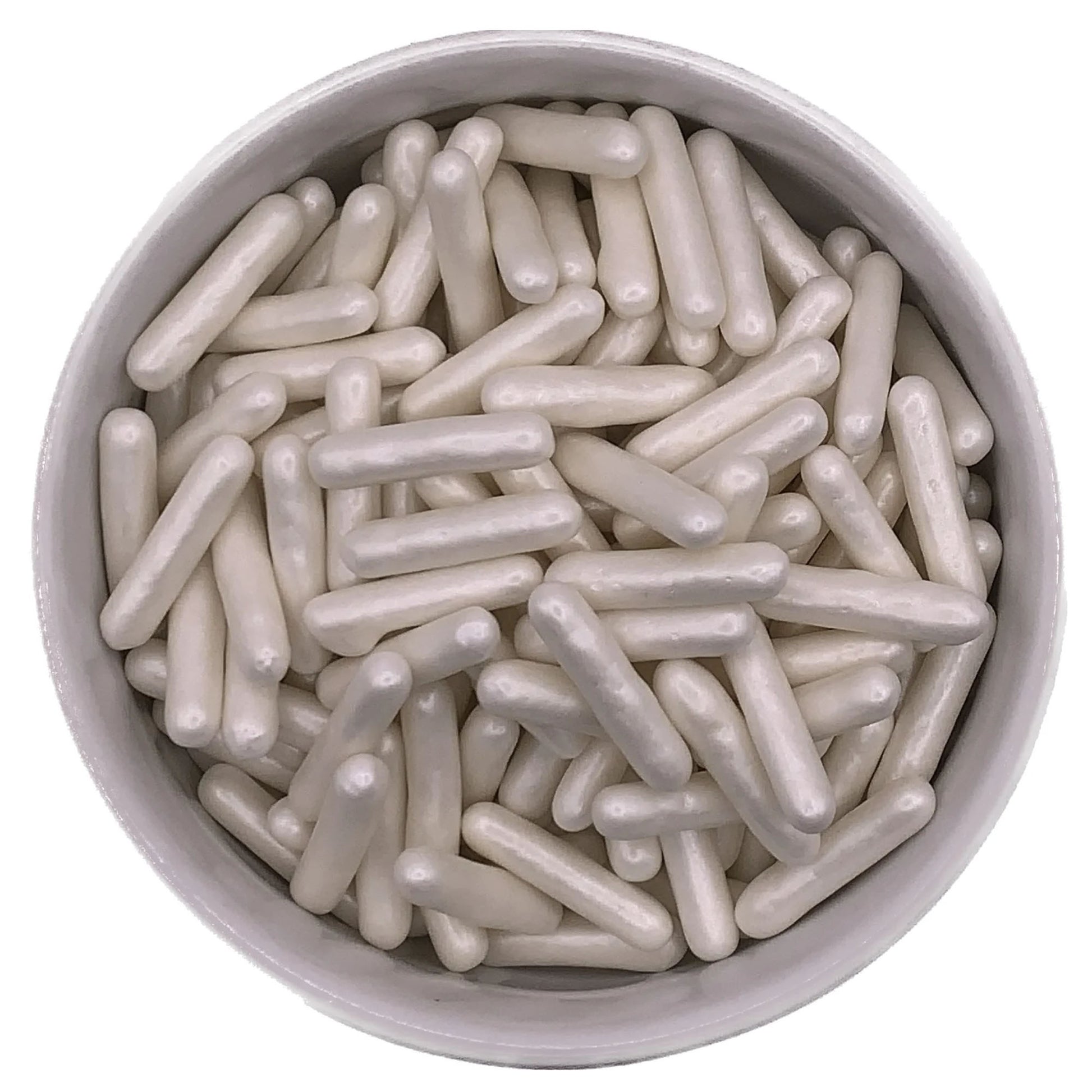 Overhead view of a bowl filled with pearlized white edible rod sprinkles, each approximately 7/8 inch long, with a smooth, glossy finish.