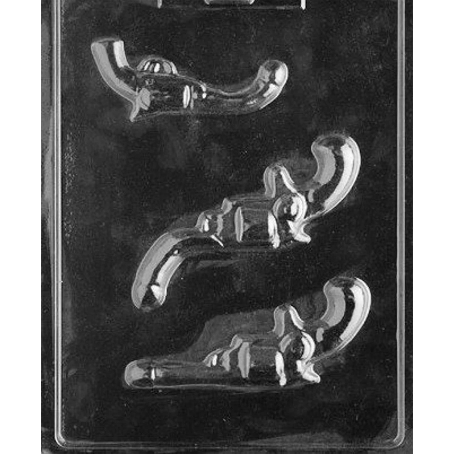 Clear Curved Penis Pistol Chocolate Mold photographed against a black background, showing three detailed revolver-shaped cavities with curved penis barrels pointing up, down, and straight.