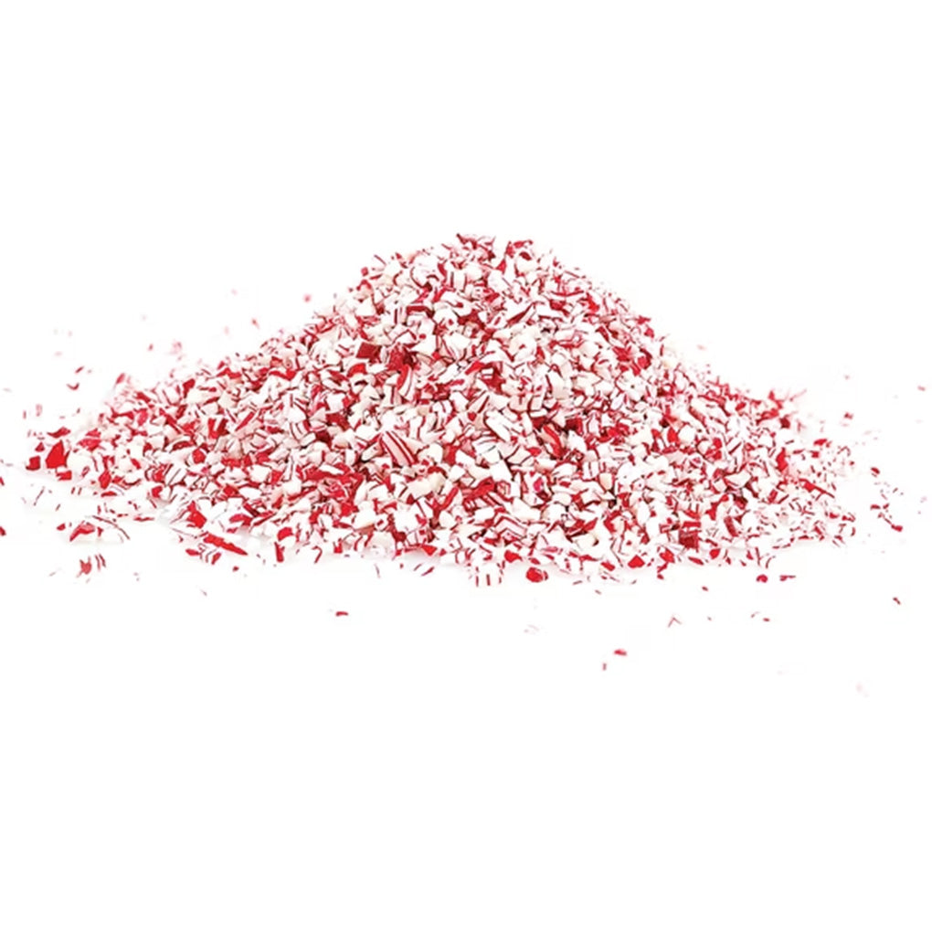 Pile of crushed red-and-white peppermint candy cane pieces in a mixture of fine bits and small crunchy chunks, sold in a 4 oz. container.
