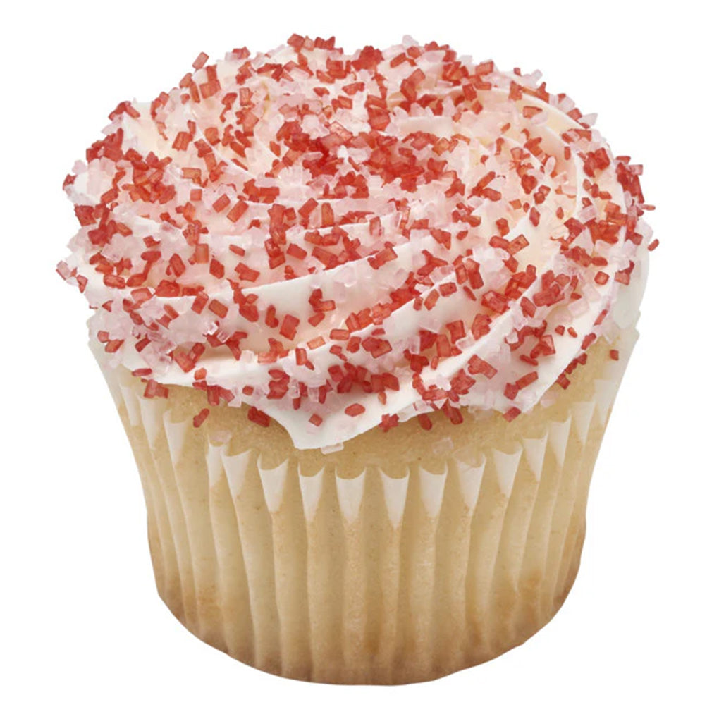 Vanilla cupcake with a white frosting swirl covered in red and clear peppermint sanding sugar crystals in a white paper liner.