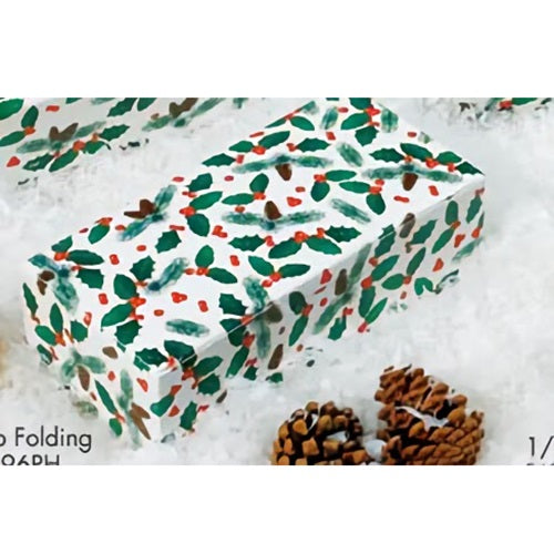 Rectangular pine cone and holly patterned candy box shown on a snowy white background with pine cones nearby, featuring green holly leaves and red berry accents.