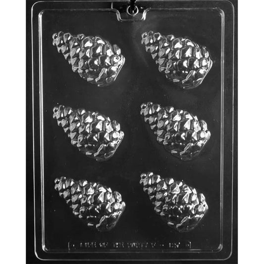 Clear plastic chocolate mold with six pinecone-shaped cavities arranged in two columns, each pinecone showing a raised, layered scale texture.