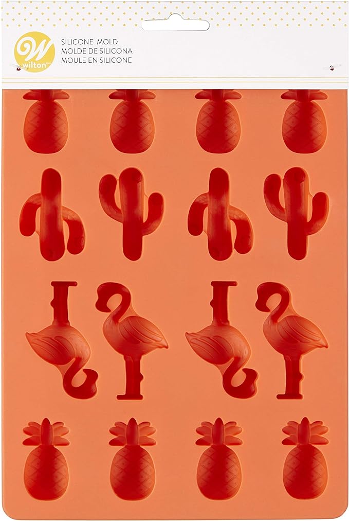 Wilton silicone mold with pineapple, cactus, and flamingo shapes for making candies or decorations.