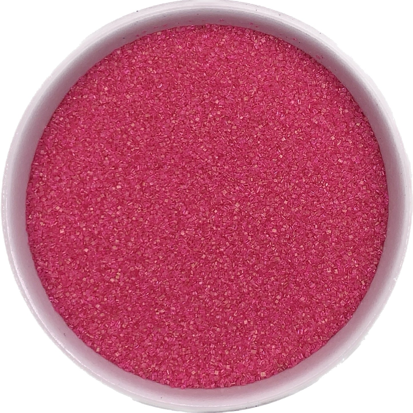 Fine pink sanding sugar poured into a white bowl, showing crystal texture and vibrant color for decorating.