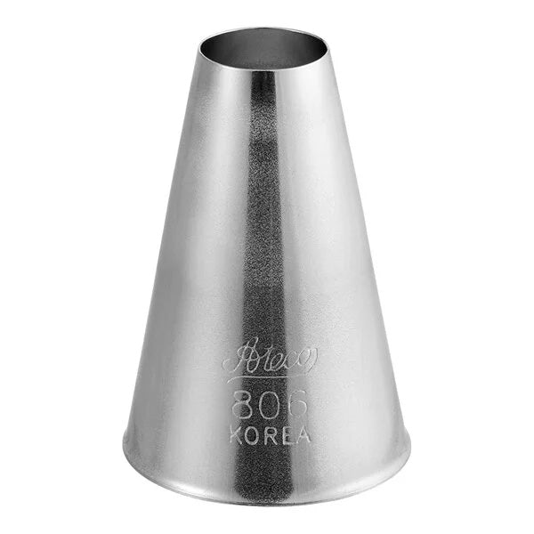 Close-up of a stainless steel Ateco 806 piping tip, cone-shaped with a wide circular 0.5-inch opening at the top and a smooth round edge.