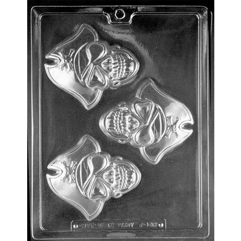 Clear Pirate Skull Chocolate Mold photographed against a black background with 3 large pirate skull cavities featuring eye patches, head wraps, pirate hats, and skull-and-crossbones accents.