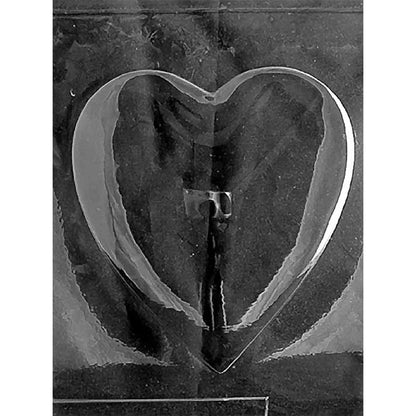 Clear plastic chocolate mold photographed against a black background featuring a large heart-shaped top.