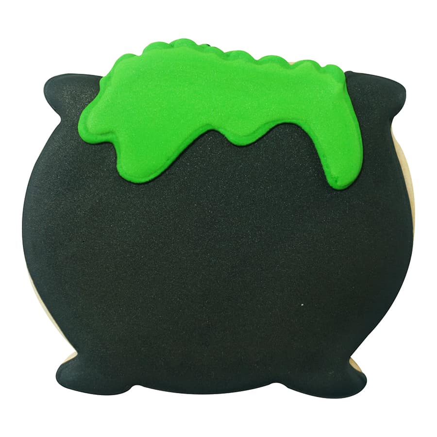 Halloween-themed cauldron cookie decorated with black icing and bright green bubbling potion details.