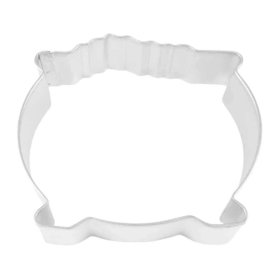 Metal cauldron-shaped cookie cutter with a wide base and scalloped top, perfect for Halloween or St. Patrick’s Day treats.