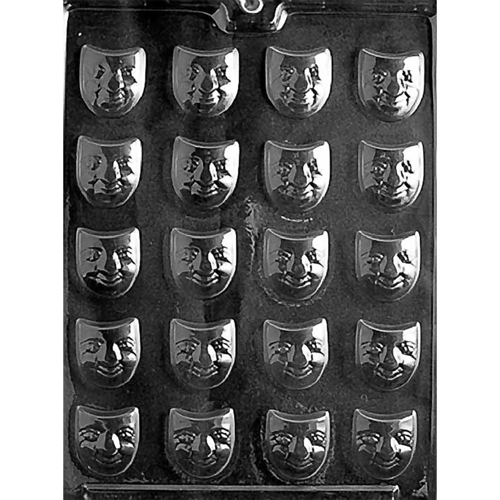 Clear plastic Purim chocolate mold with 20 small mask-shaped cavities featuring raised eyes, noses, and smiling faces