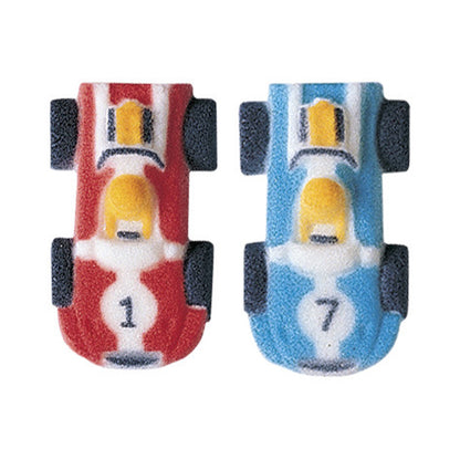 Two pressed sugar race car decorations shown from above, one red and one blue, with black wheels, white striping, and small number details.
