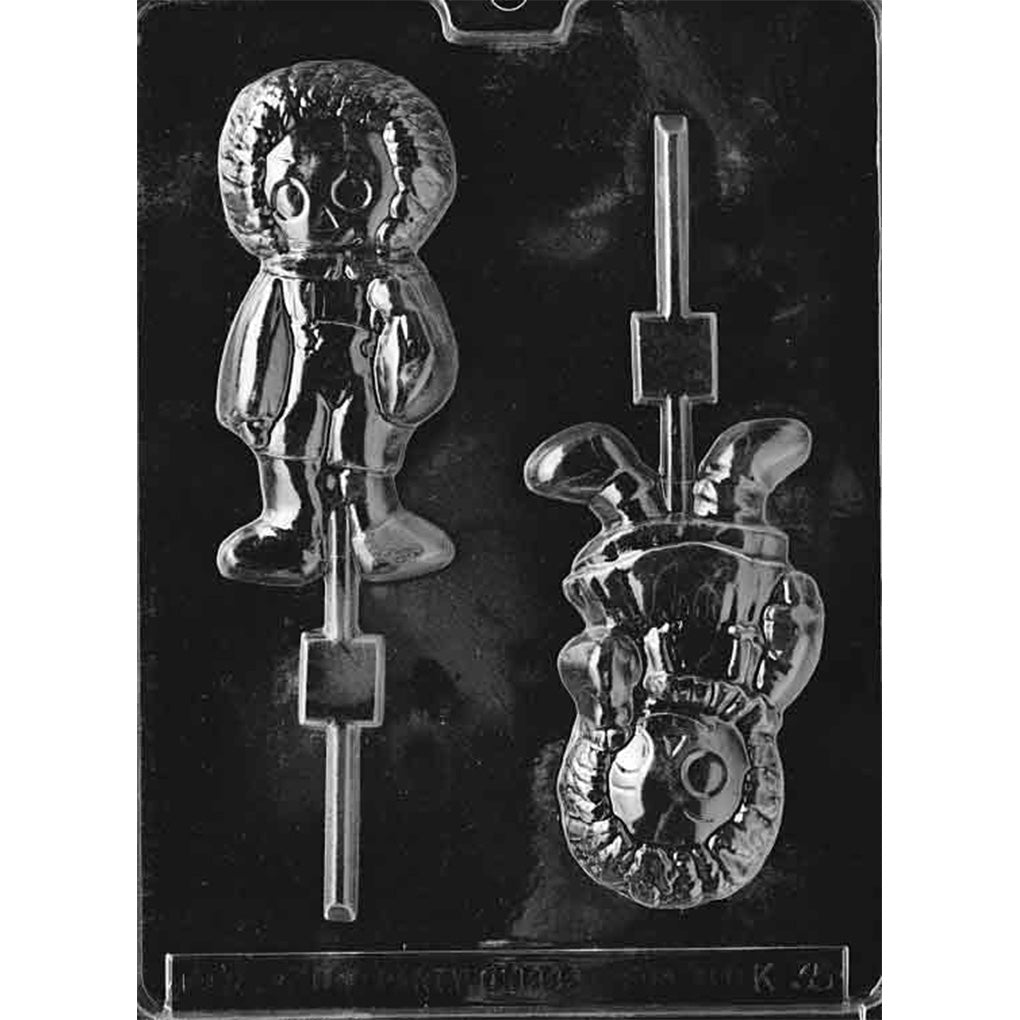 Clear Rag Dolls Chocolate Lollipop Mold with two different doll cavities, including one in overalls and one in a dress