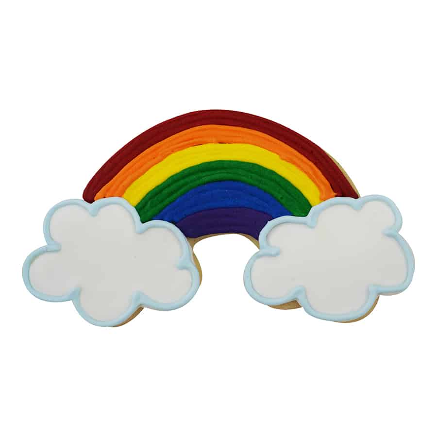 Decorated rainbow cookie with vibrant icing in red, orange, yellow, green, blue, and purple, finished with white clouds.