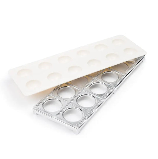 Ravioli maker set with white plastic press and aluminum cutting frame with round openings