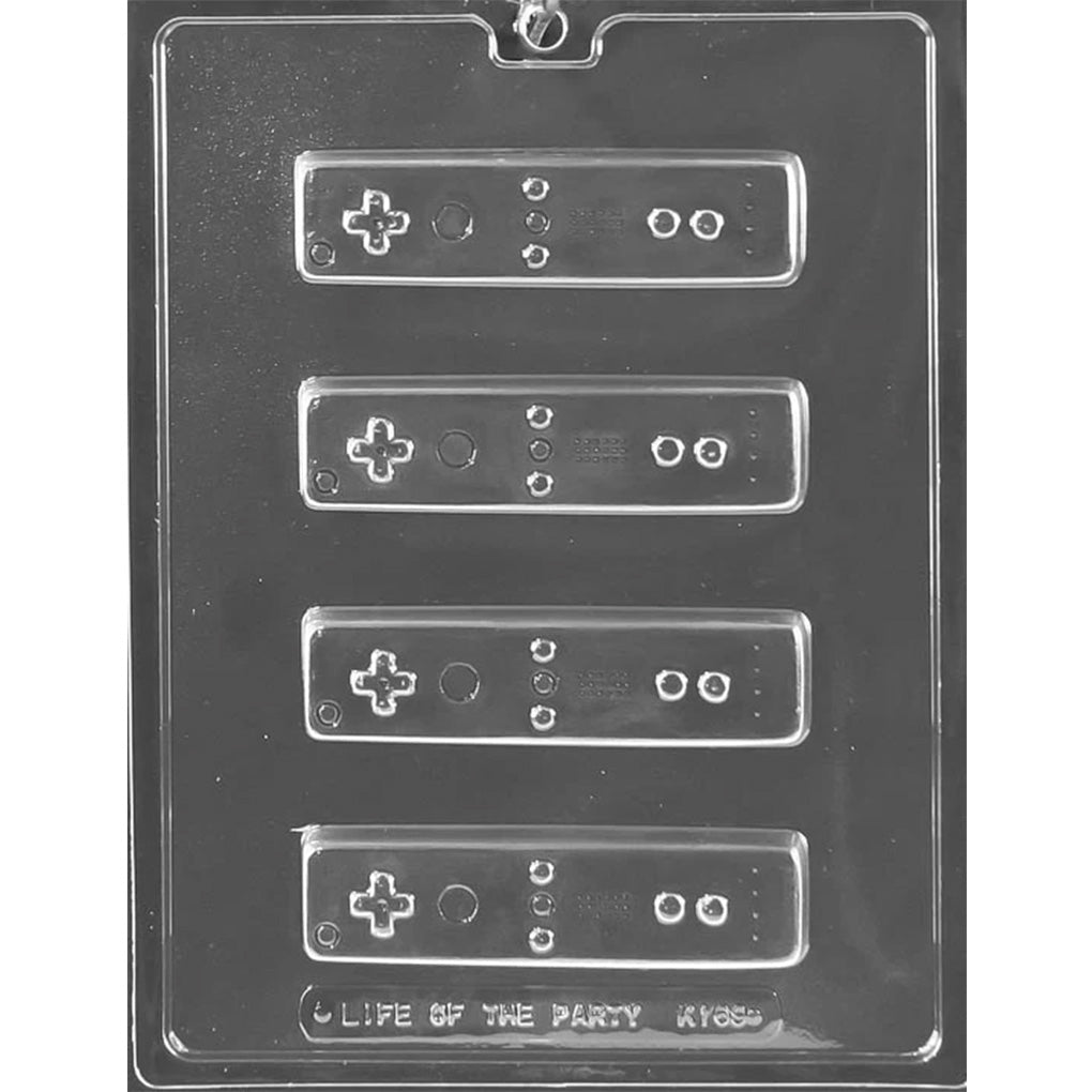 Clear plastic game controller chocolate mold with four 4 1/2 x 1 1/4 x 1/2-inch rectangular cavities featuring raised directional pads, buttons, and speaker details.