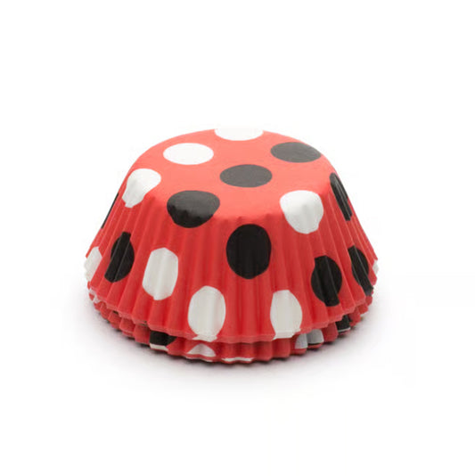 Stack of red baking cups with black and white polka dots, standard size.