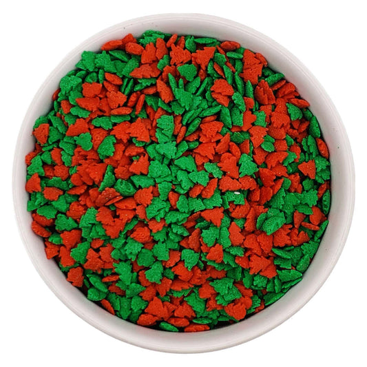 Red and green Christmas tree sprinkles in a white bowl, festive holiday cookie and cupcake decorations in 3.2 oz container