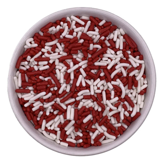 Bowl of red and white jimmies sprinkles, perfect for decorating cookies, cupcakes, and holiday desserts