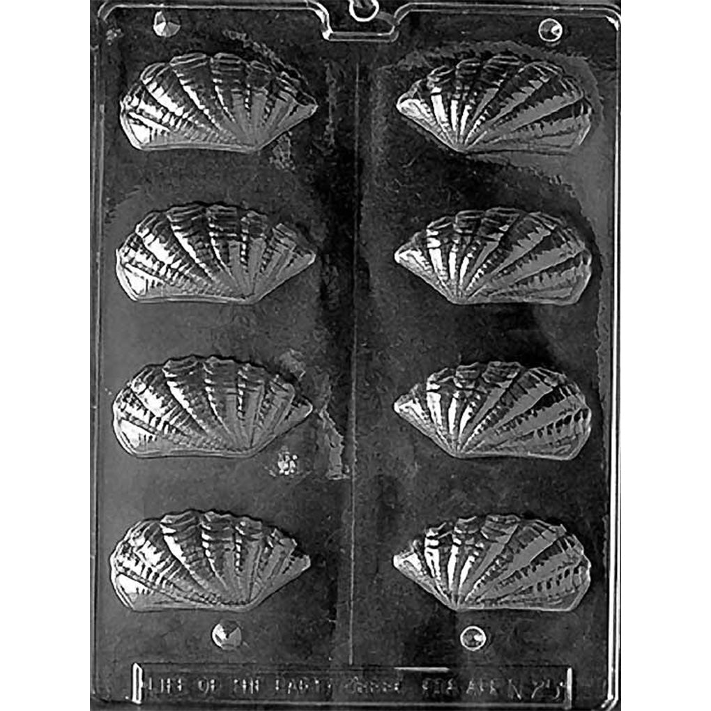 Clear plastic 3D chocolate mold with eight ribbed seashell cavities designed to be cut into two halves for assembling dimensional shell-shaped chocolates.