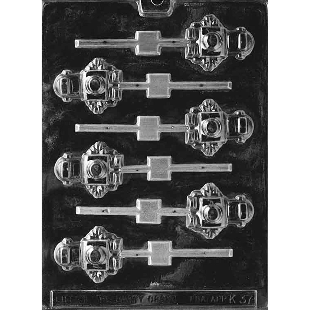 Clear chocolate lollipop mold with six retro robot-shaped cavities featuring boxy bodies, rounded heads, arms, and circular center panels.