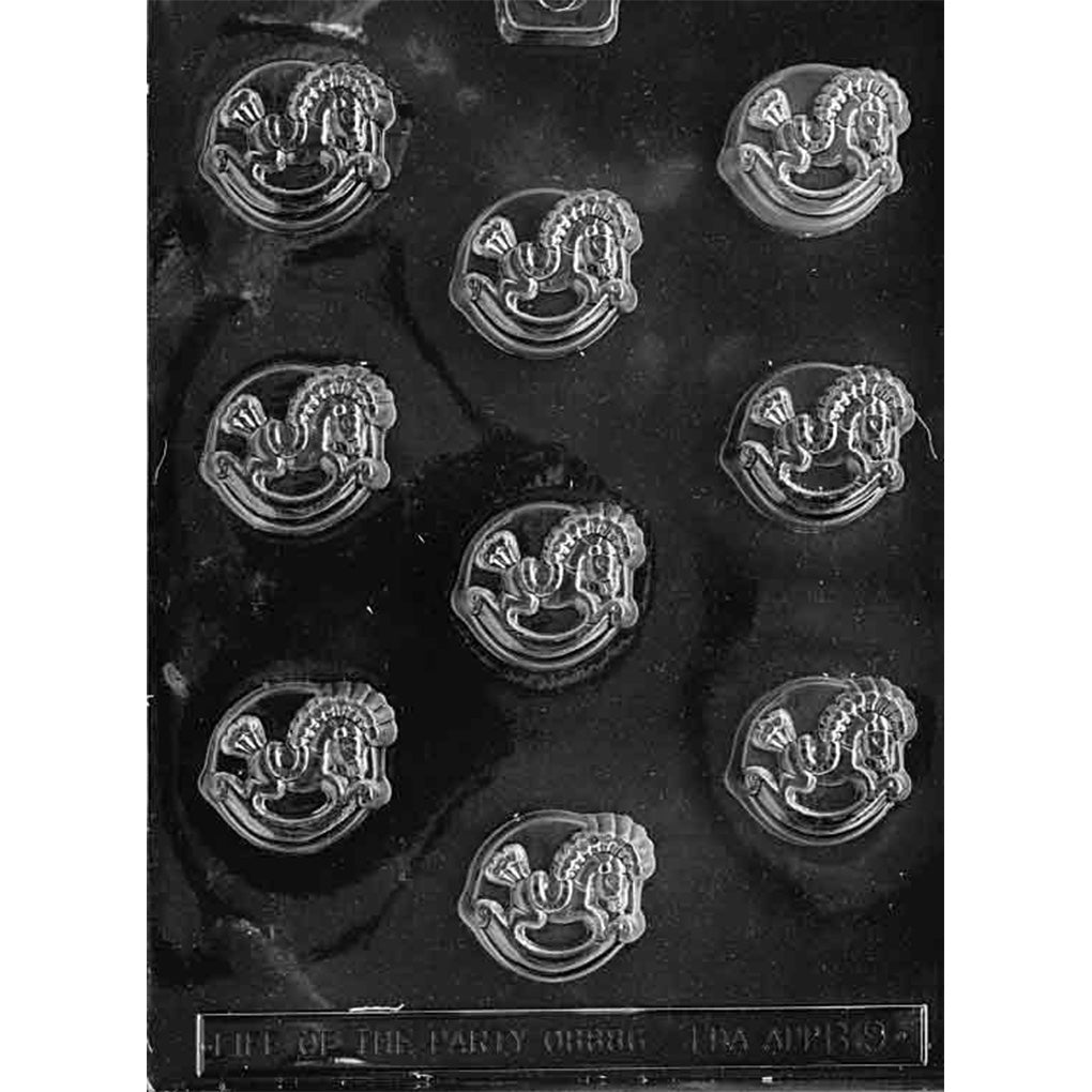 Clear plastic chocolate mold with round cavities featuring an embossed rocking horse design.