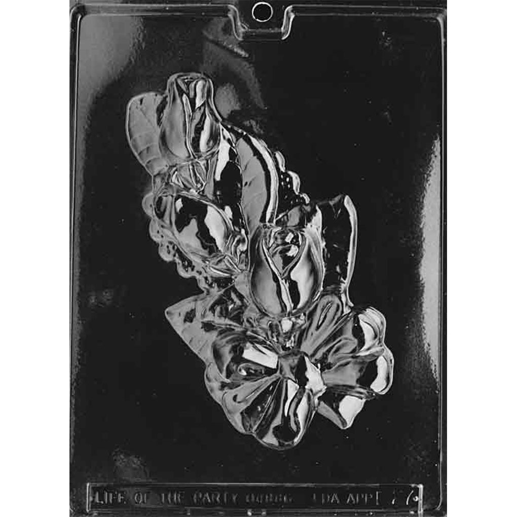 Single-cavity rose corsage chocolate mold measuring 4 1/4 x 7 5/8 inches with layered rosebuds, leaves, blossoms, and tied ribbon details