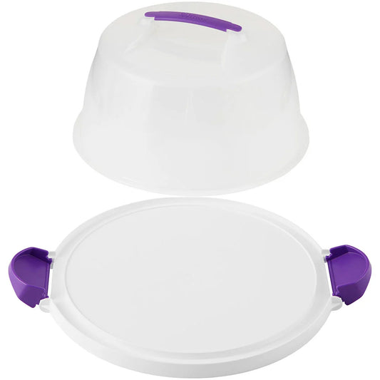 Round cake and cupcake carrier with a white reversible base, translucent lid, purple carrying handle, and two purple locking latches