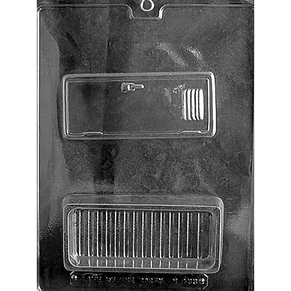 Clear plastic chocolate mold with two cavities that form a school locker pour box, including a deep locker-shaped base and a matching locker-door lid with vent lines and a handle.