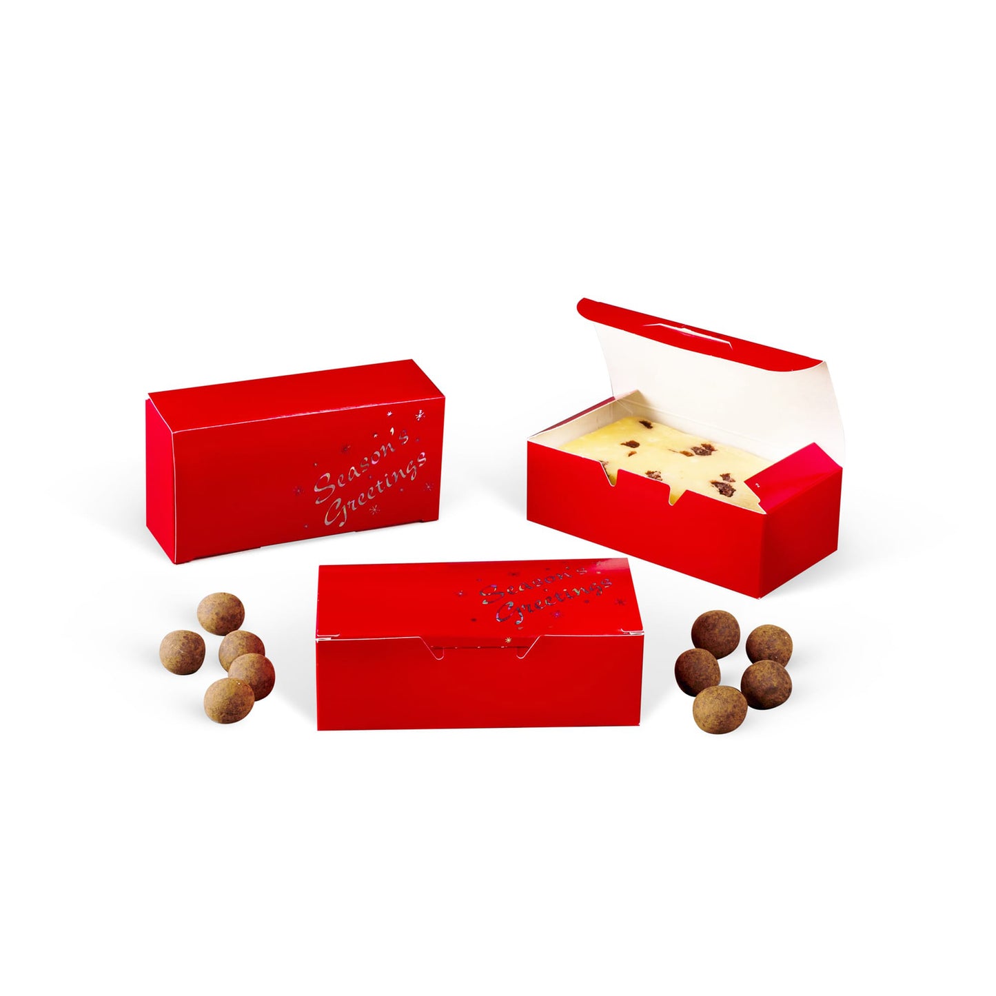 Red Season’s Greetings candy boxes shown on a white background, including an open box holding a slab of candy and cocoa-dusted truffles placed nearby.