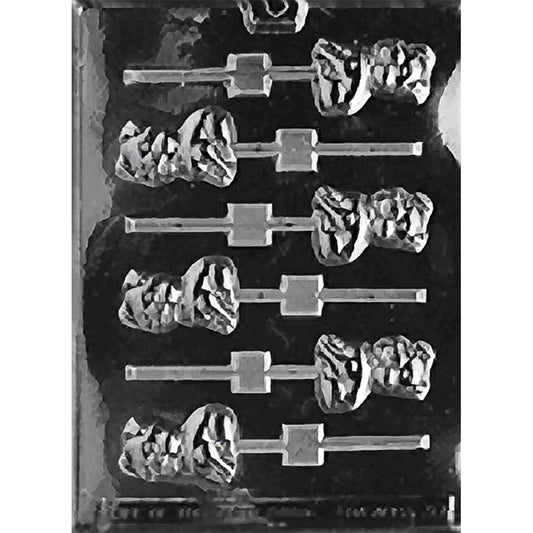 Clear chocolate lollipop mold with six pig-shaped cavities arranged in two columns on a dark background.