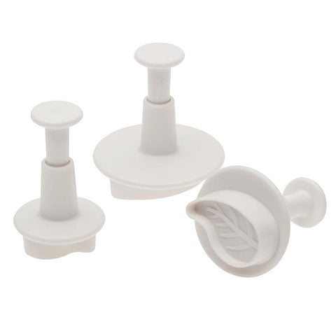 Set of three white plastic curved leaf sugar paste cutters with spring-loaded plungers, designed for detailed fondant and gum paste decorations.