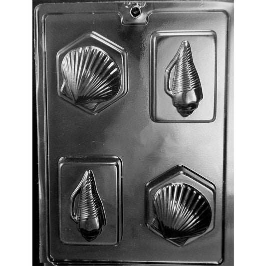Clear plastic chocolate mold photographed on a black background with four bar cavities, including hexagon bars with raised scallop shells and rectangular bars with raised spiral conch-style shells.
