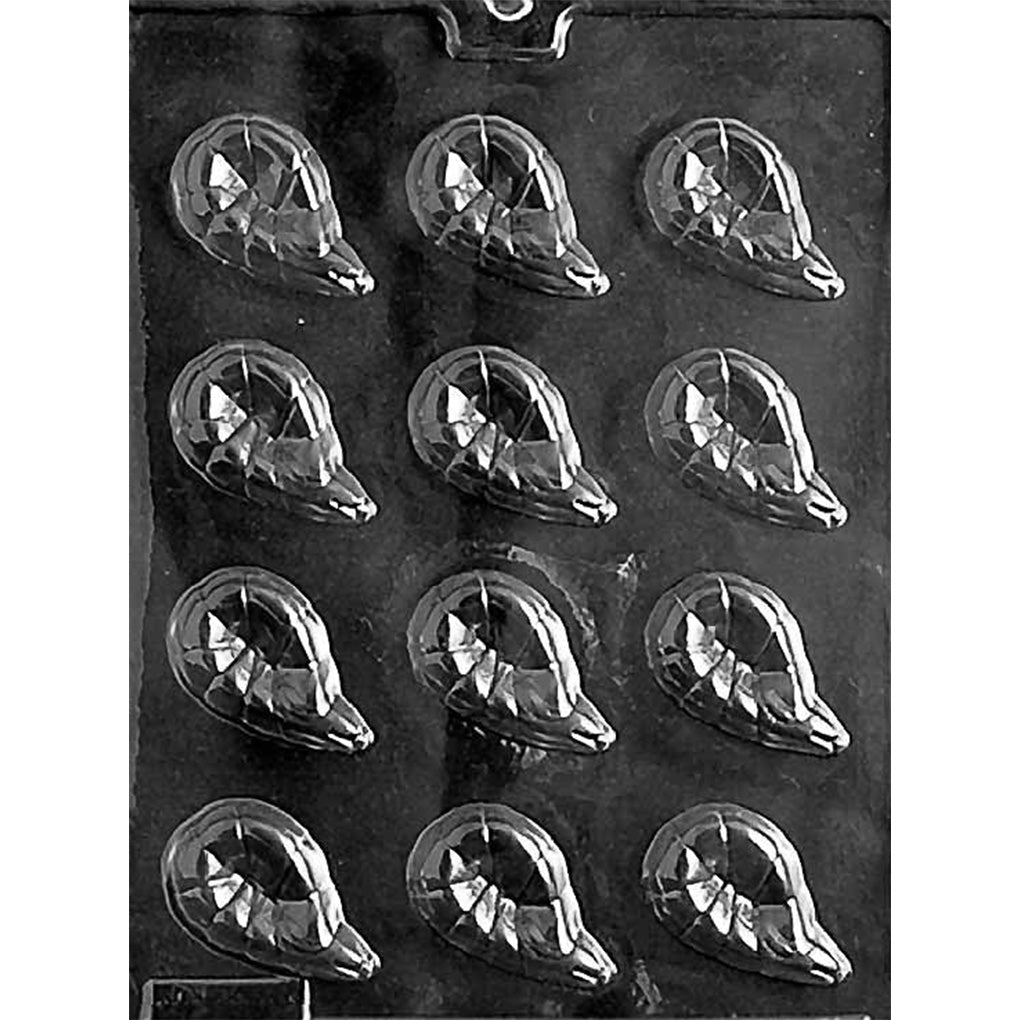 Clear plastic shrimp chocolate mold photographed on a black background, showing multiple small shrimp-shaped cavities with curved bodies and textured detail.