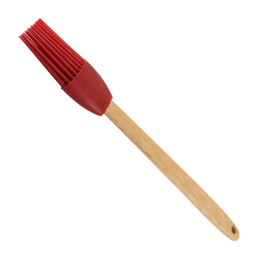 Silicone pastry brush with red silicone bristles and a light wood handle, shown diagonally on a white background with a small hanging hole at the handle end.