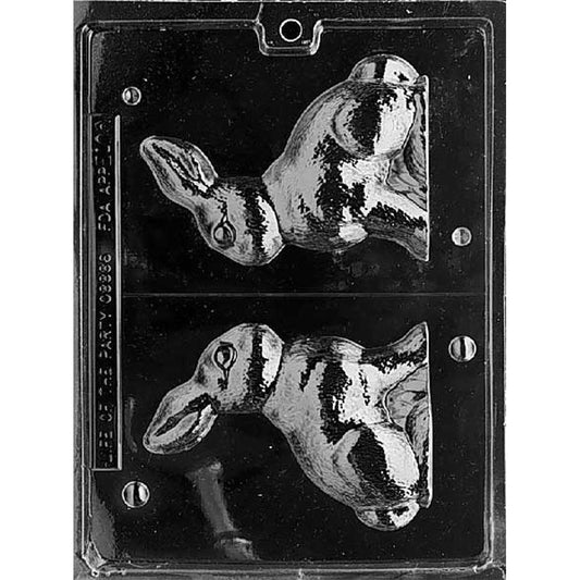 Clear plastic sitting rabbit 3D chocolate mold with two large bunny half cavities, showing an upright seated rabbit with long ears and rounded body detail.