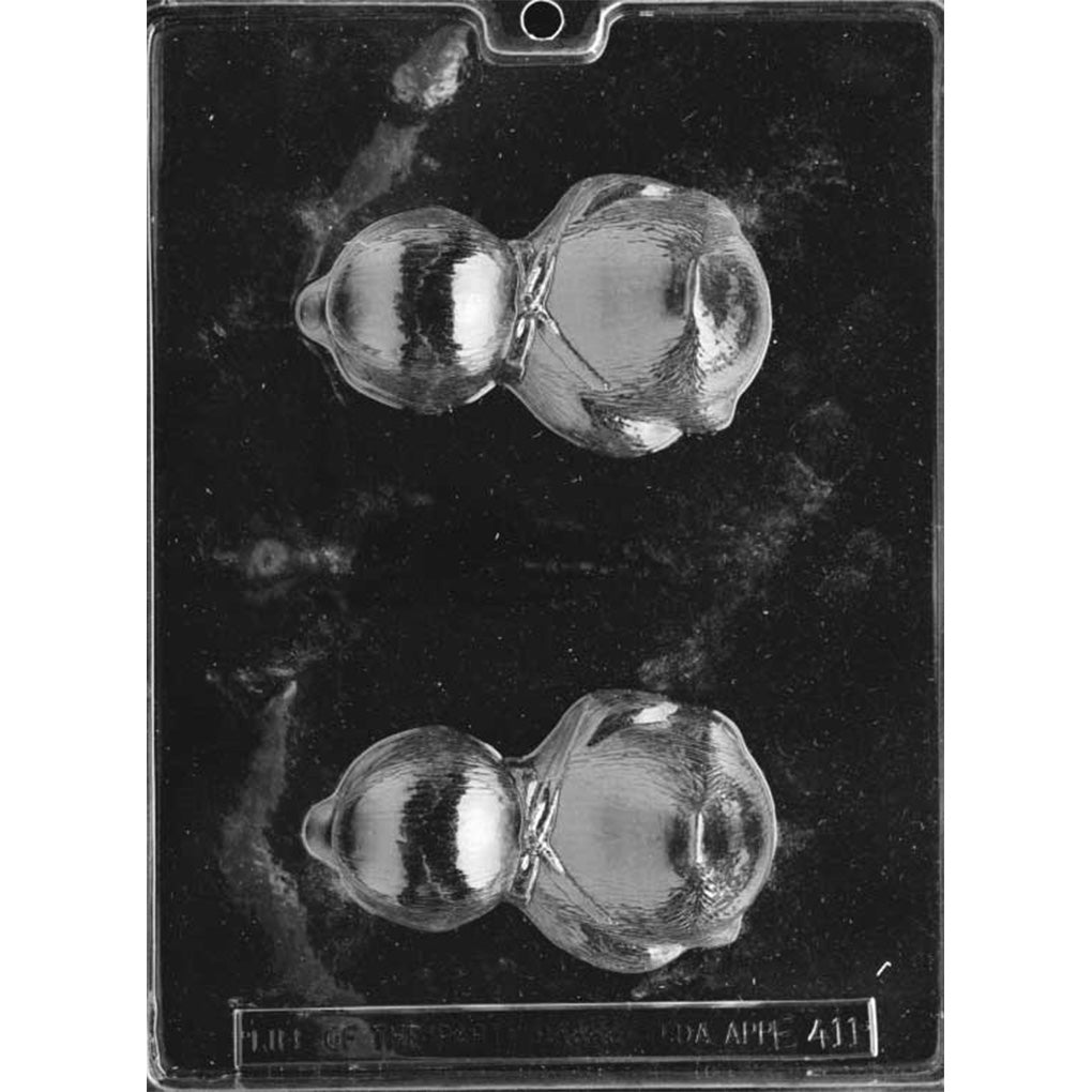 Clear plastic chocolate mold with two deep baby chick cavities, each lying flat on its stomach with its head down, wings tucked, and tail pointing upward.