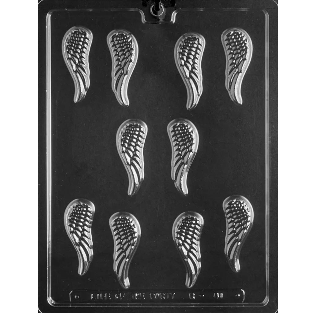 Clear plastic chocolate mold with multiple small angel wing cavities featuring raised feather details, shown against a dark background.